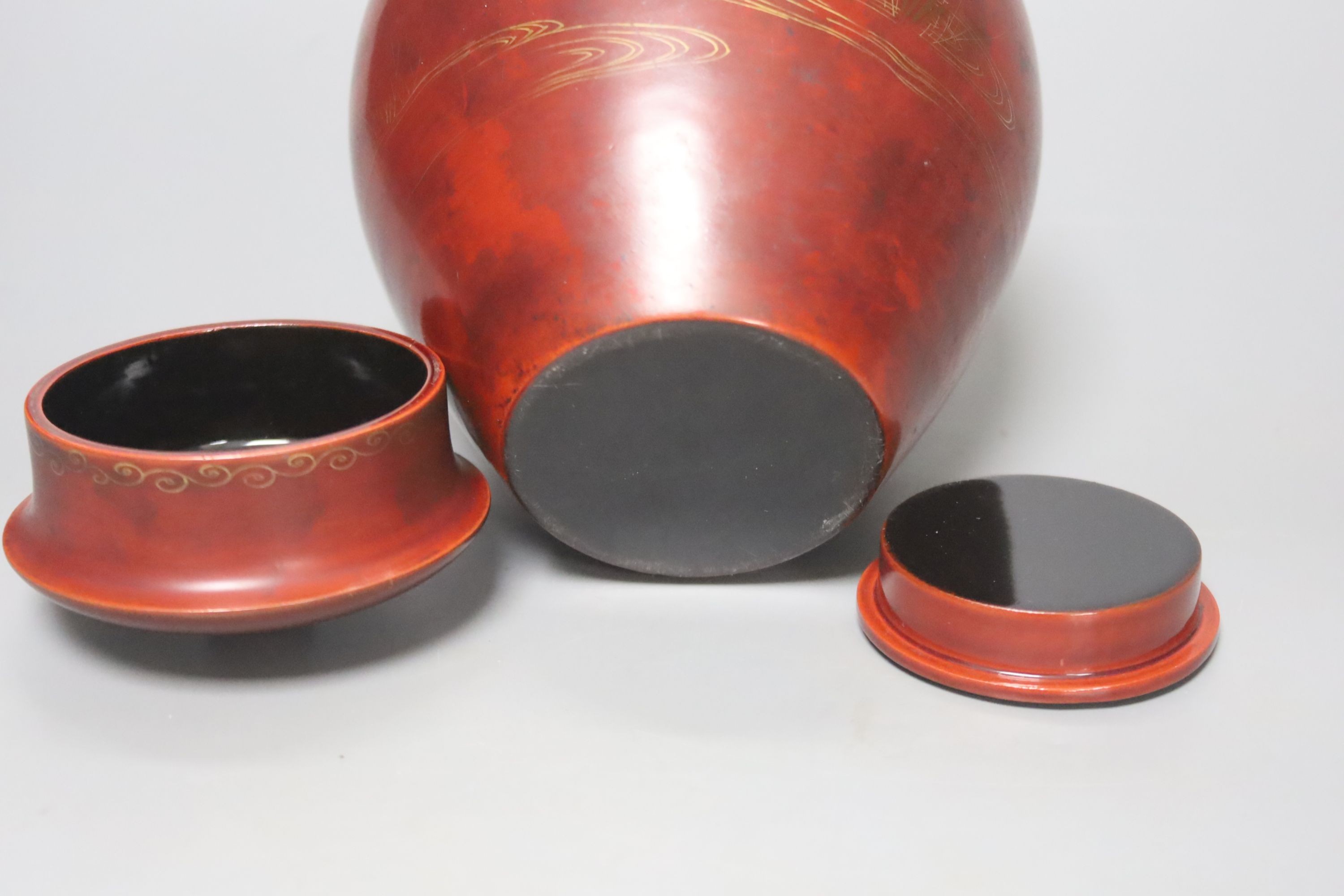 A Chinese red lacquer tobacco jar and cover, height 18cm